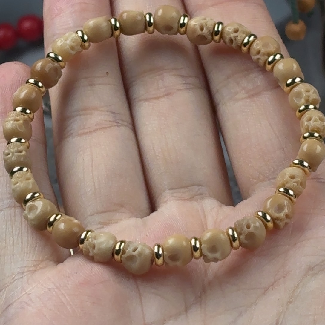 龙脊菩提手串可***乐尸陀林骷髅手串