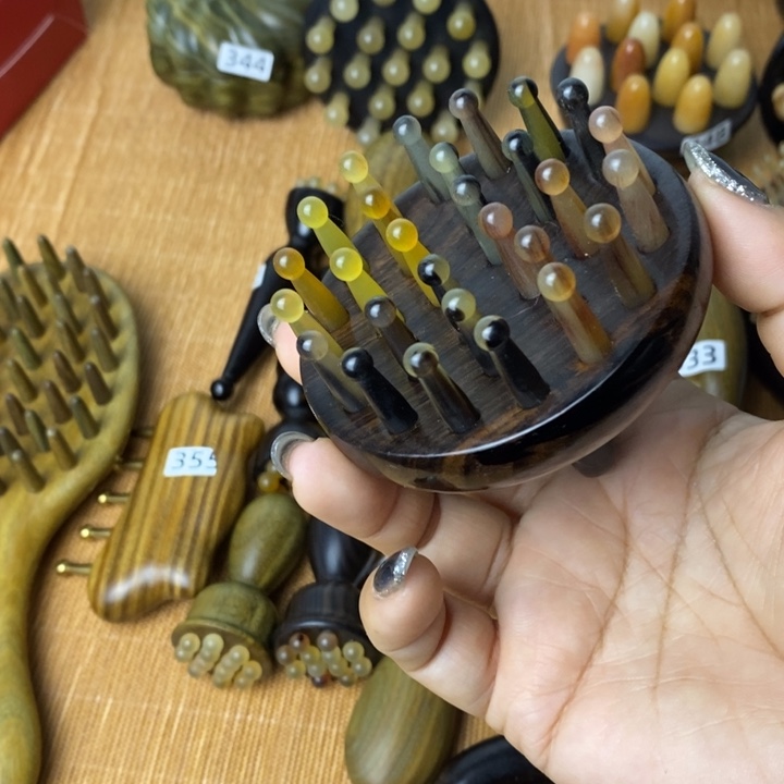 紫光檀28齿羊角按摩梳