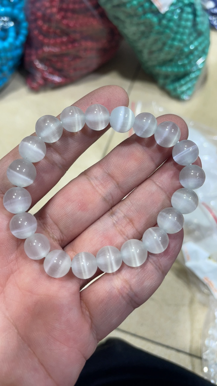75卡10白猫眼手串