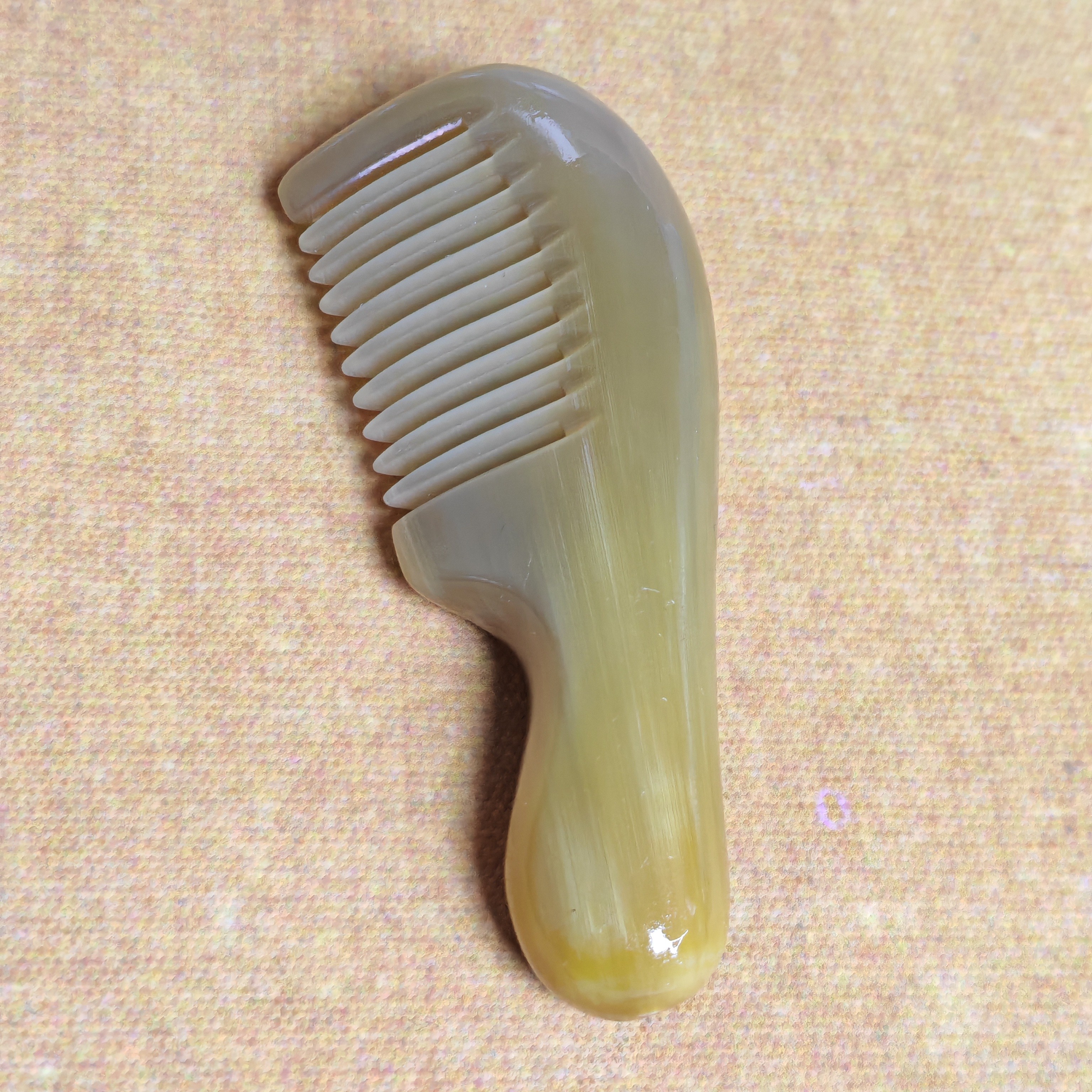 牦牛梳子随身带牦牛角梳手把件按摩脸梳头部按摩家用精品齿梳发梳