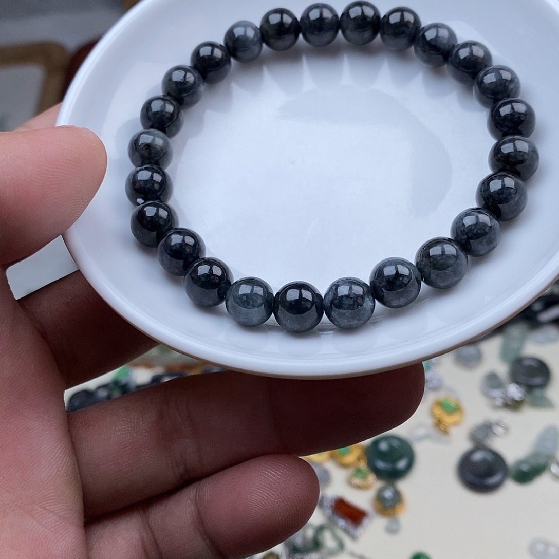 翡翠戒指未镶嵌乌鸡手串