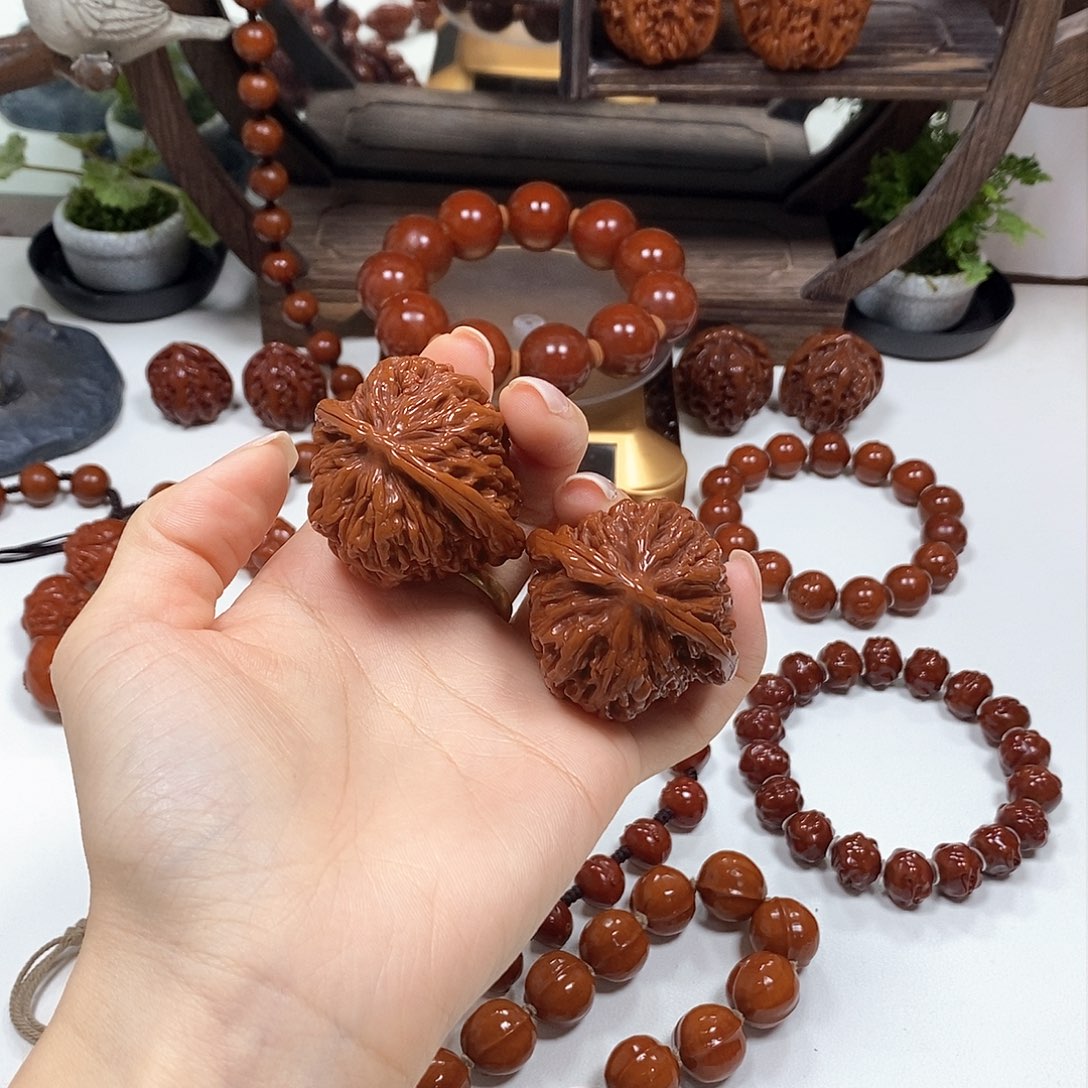 橄榄核把件平****糕四座楼狮子头