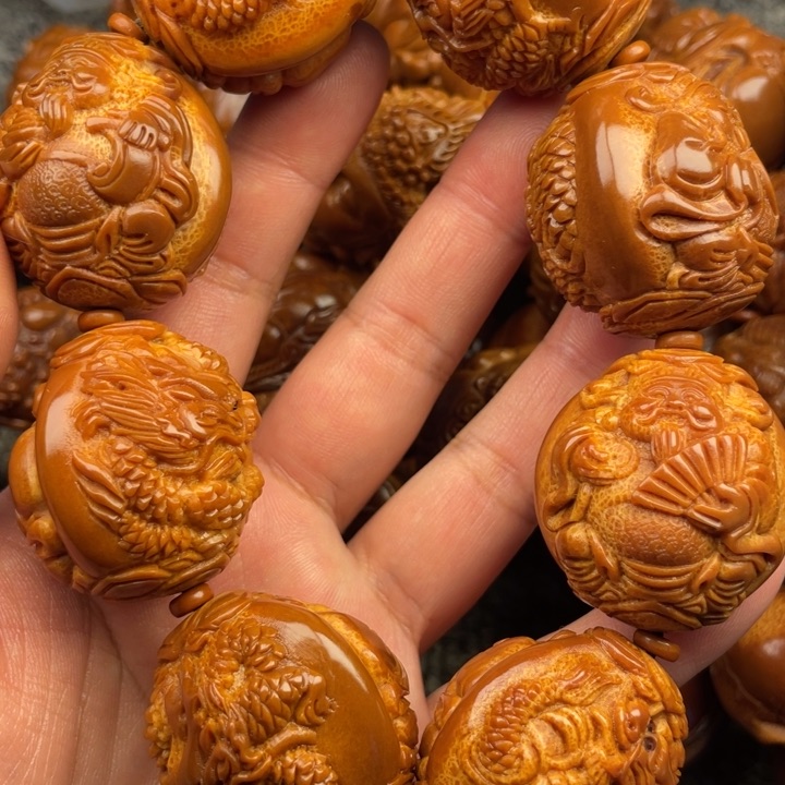 橄榄核吊坠沈****店橄榄核手持