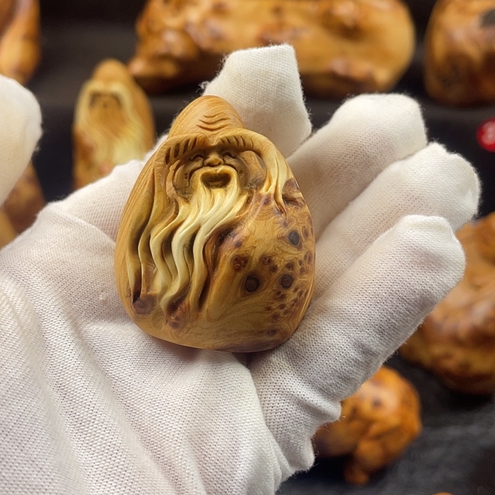 酩***悦柏木（崖柏）寿星手把件