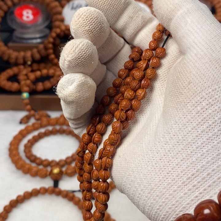 桃核吊坠R****.秦岭龙纹桃核