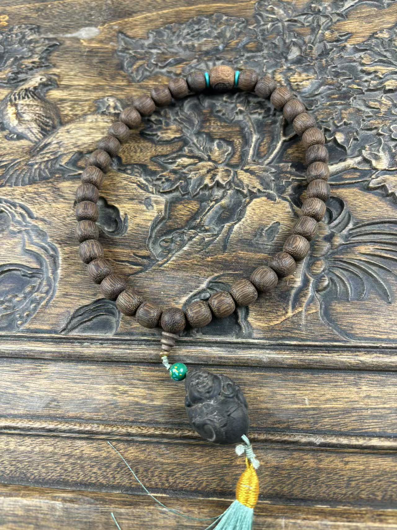 手持手串滴血莲花菩提