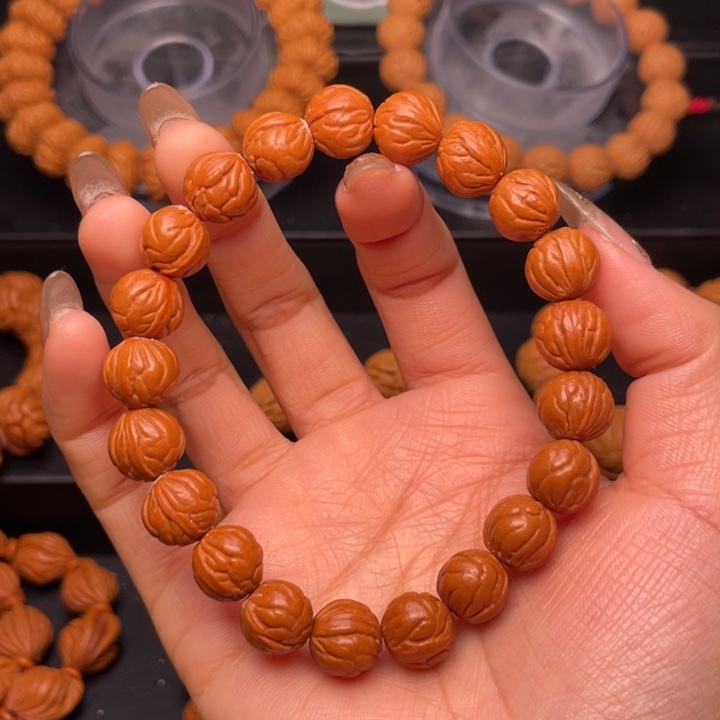 桃核手串1.2尺寸玉龙脊（54号链接）