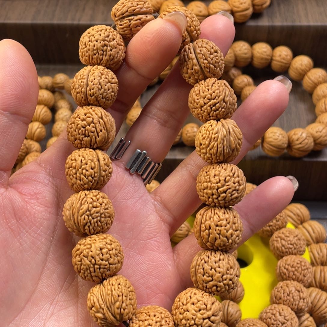 桃核手串?****?龙鳞凤尾