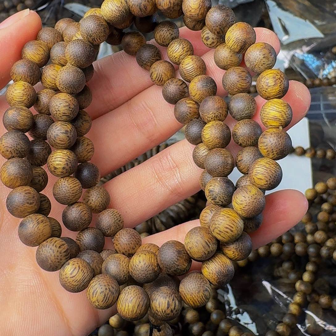 沉香手串卡七圆珠老白棋