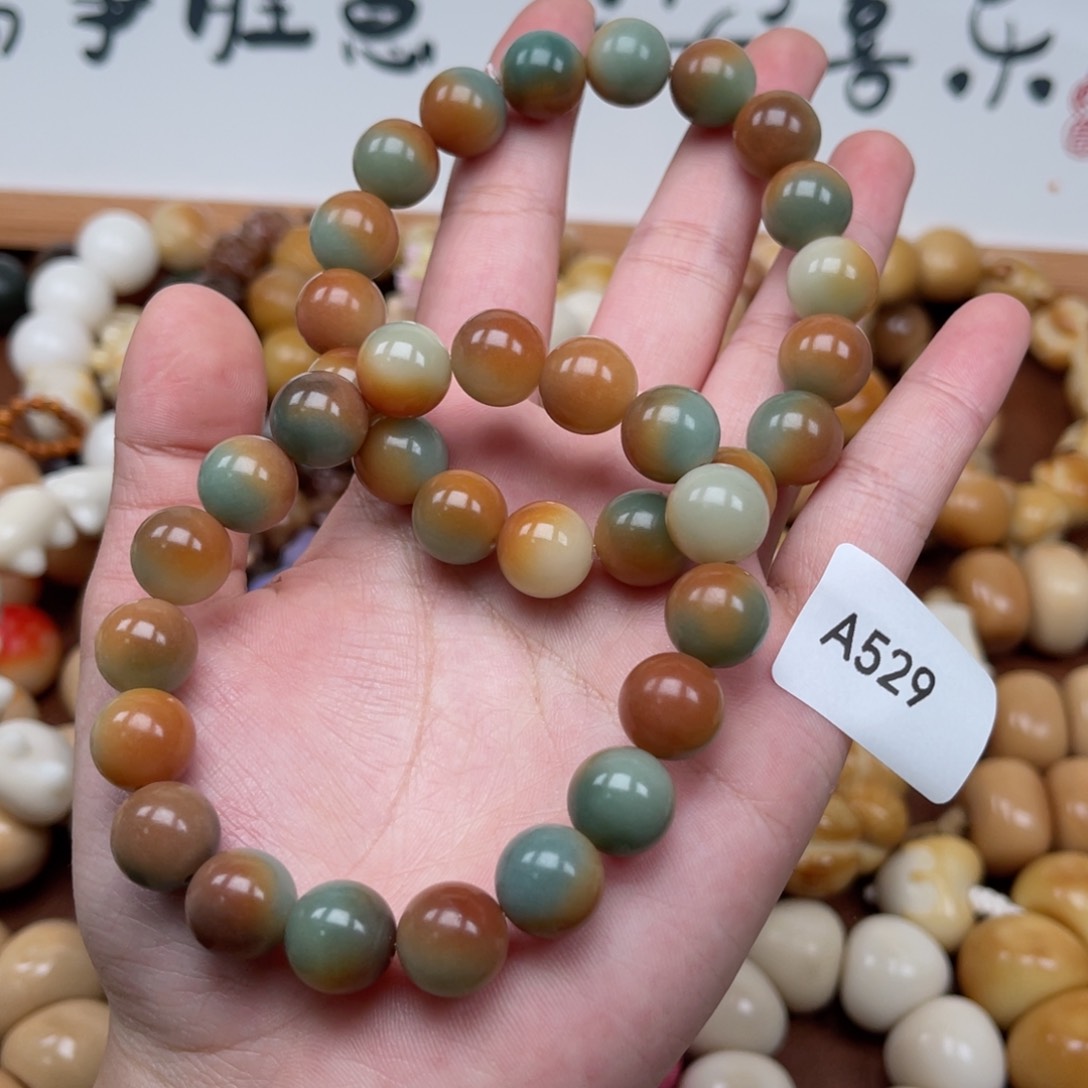 吊坠菩提根/象牙果A529圆珠11mm通货一串随机