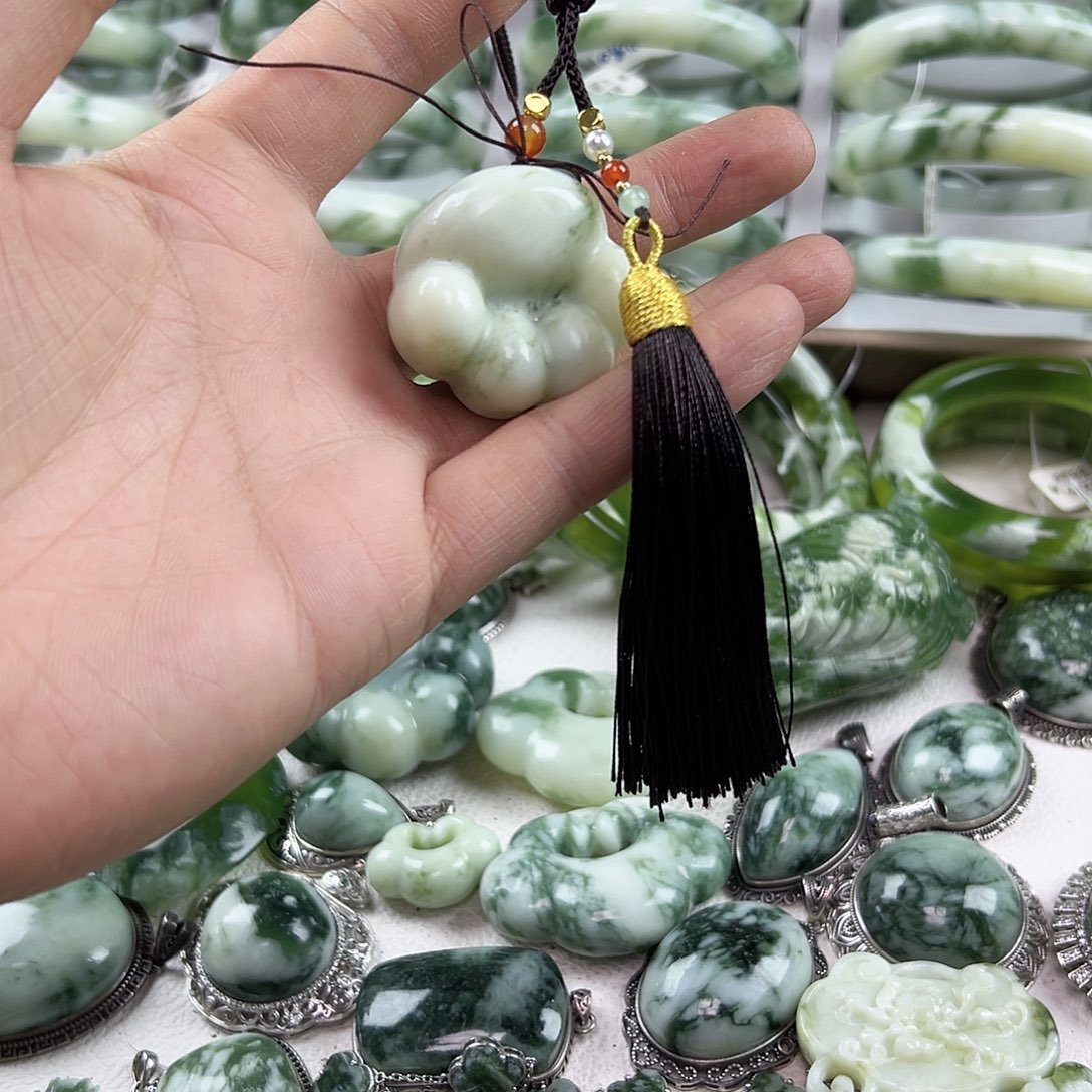 蛇纹石玉合金手把件