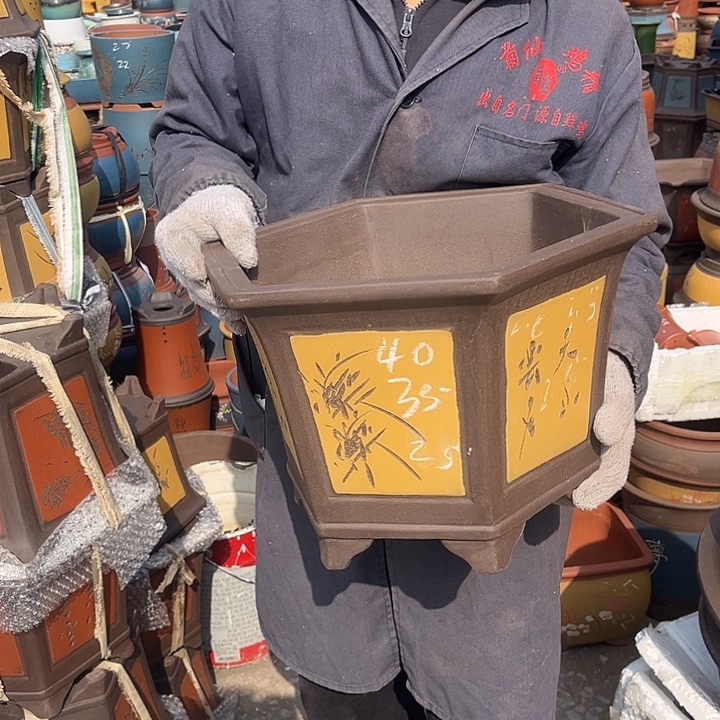 紫砂紫砂花盆和红陶茶具