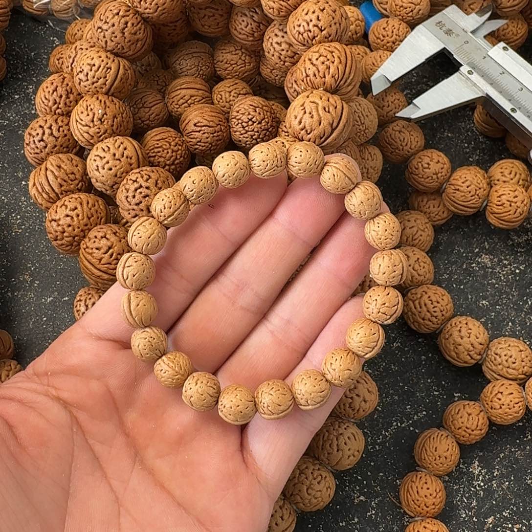 ঞ***࿐吊坠桃核野生手串