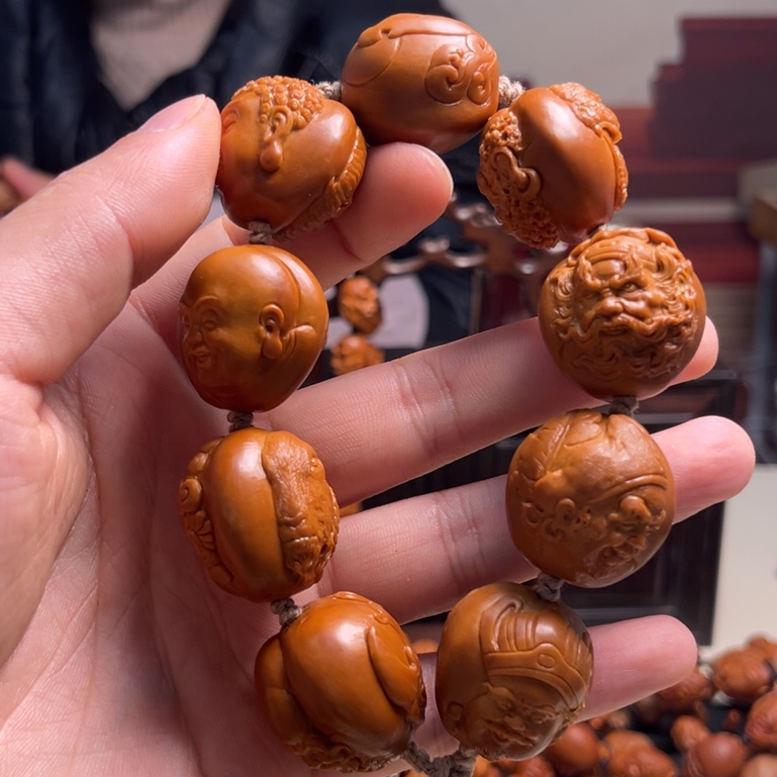 橄榄核吊坠裤****换百兽群仙