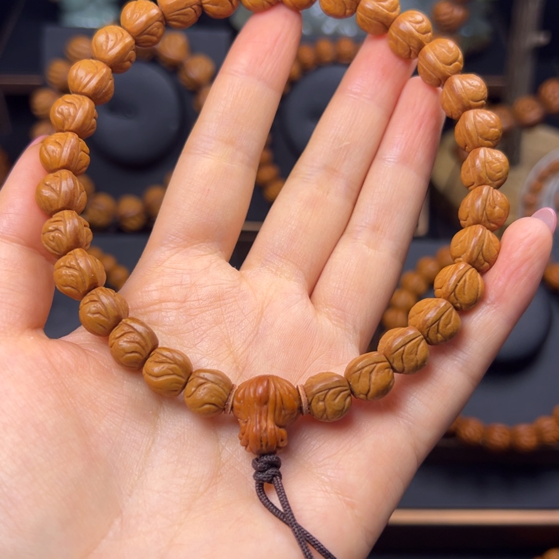 ****师手串桃核野生玉龙脊10