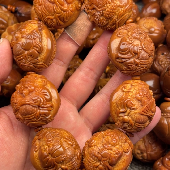 橄榄核吊坠王*祥橄榄核手持