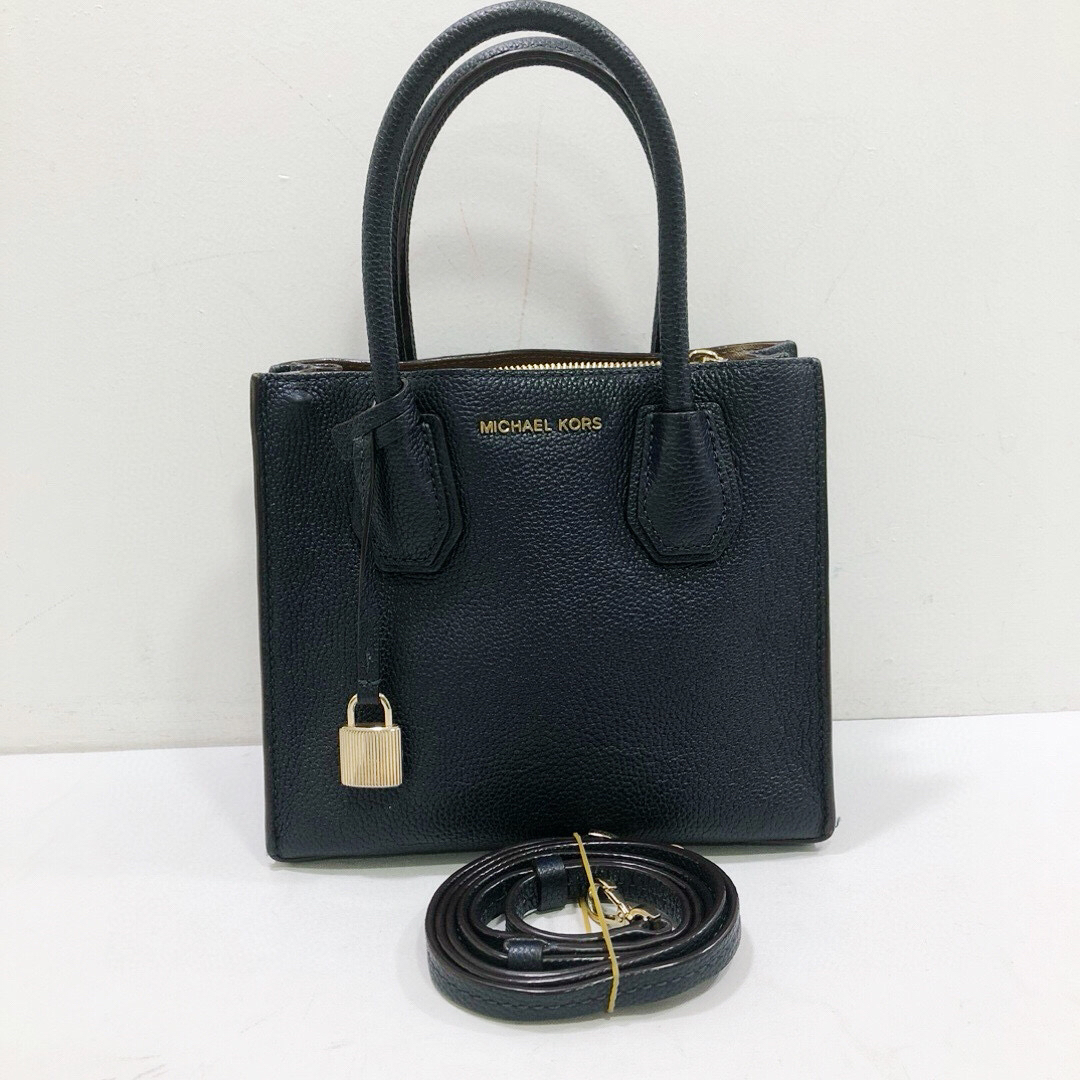 95新 MICHAEL KORS/迈克高仕 mk全皮深蓝色锁头手提单肩斜挎包
