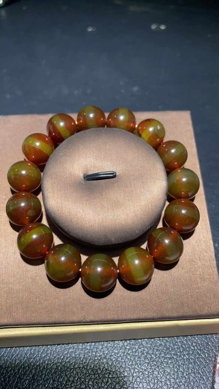 312  卡14果绿孔雀手链