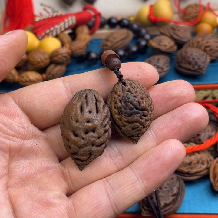 @***琳木质非金属桃枭吊坠桃枭吊坠