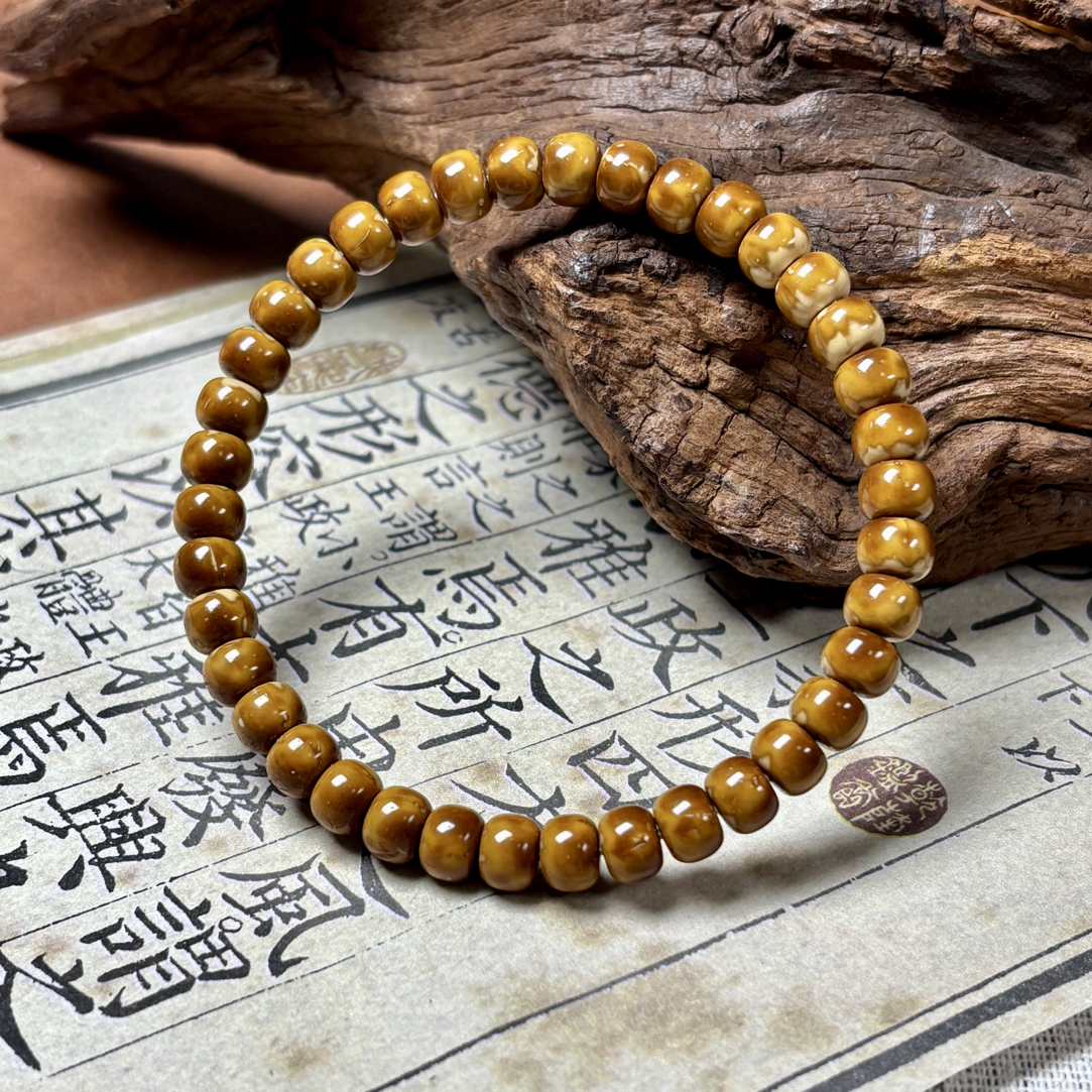 紫金鼠手串 焦糖奶盖 纯肉实心花皮老型 尺寸7.3*5.6mm