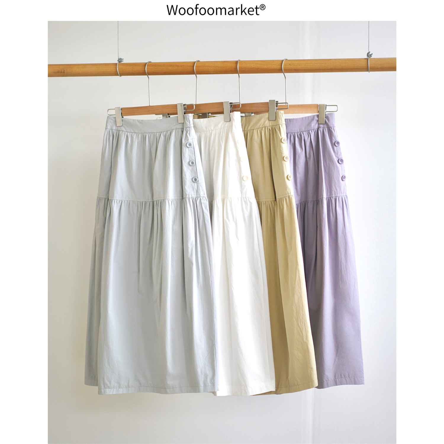 【海街日集】轻花苞纽扣半松紧腰a字中长半身裙 AWQZ001