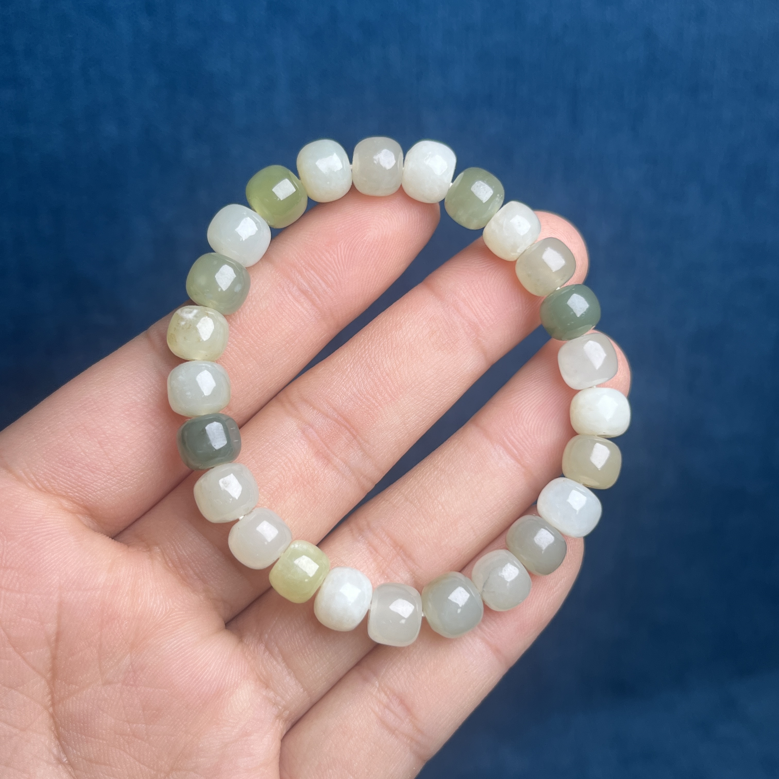 S0302和田玉青海料多宝放漏品手串8*7MM