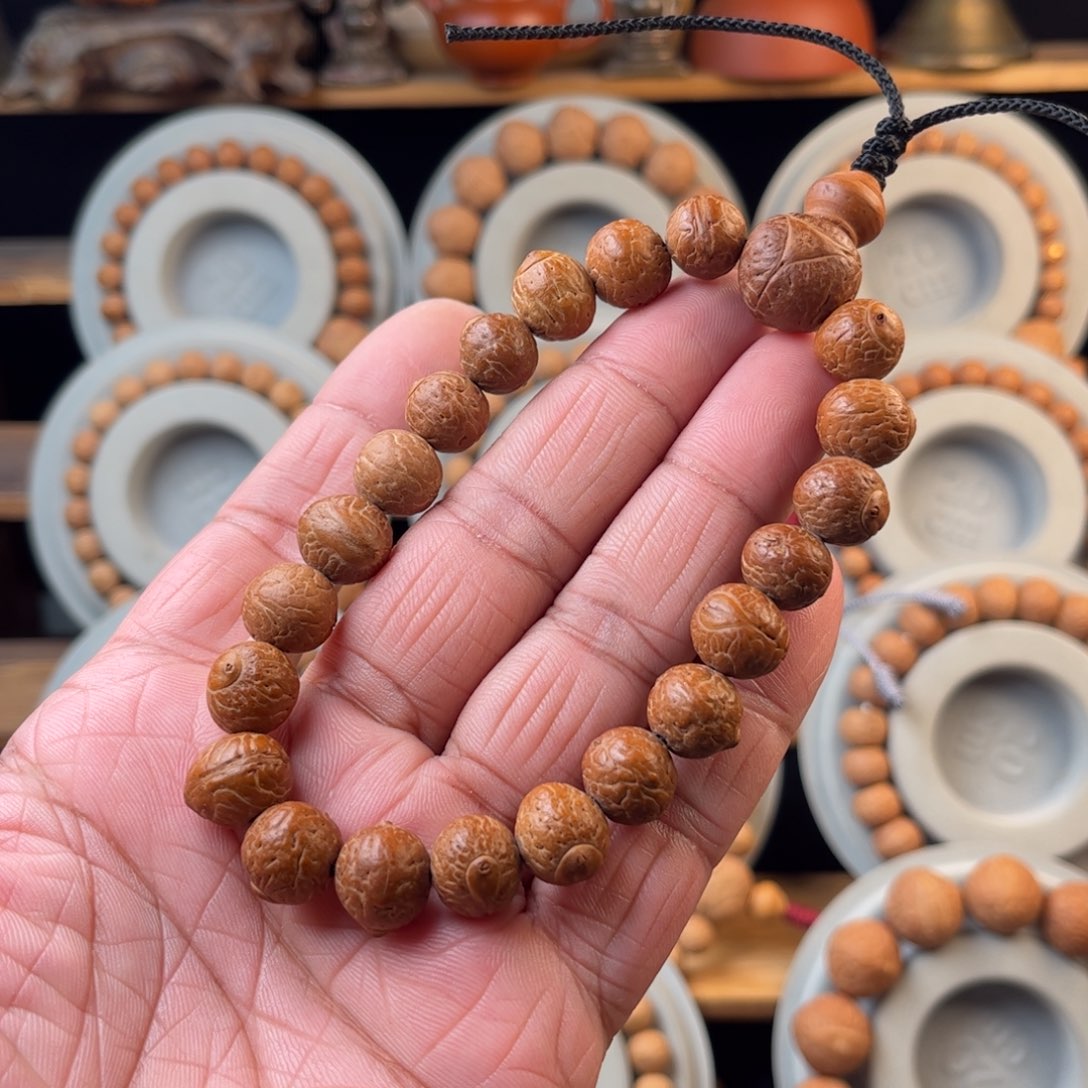 凤眼菩提吊坠ρ*佛眼手串