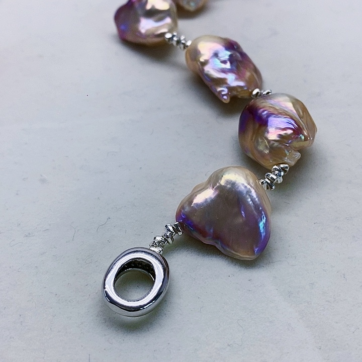 银S925镶嵌耳饰淡水珍珠八****?