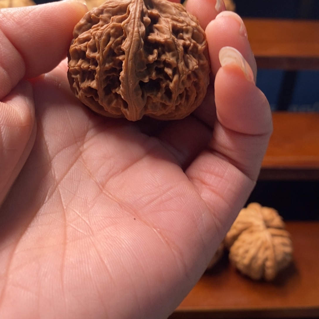 燃***坐文玩核桃吊坠半壁