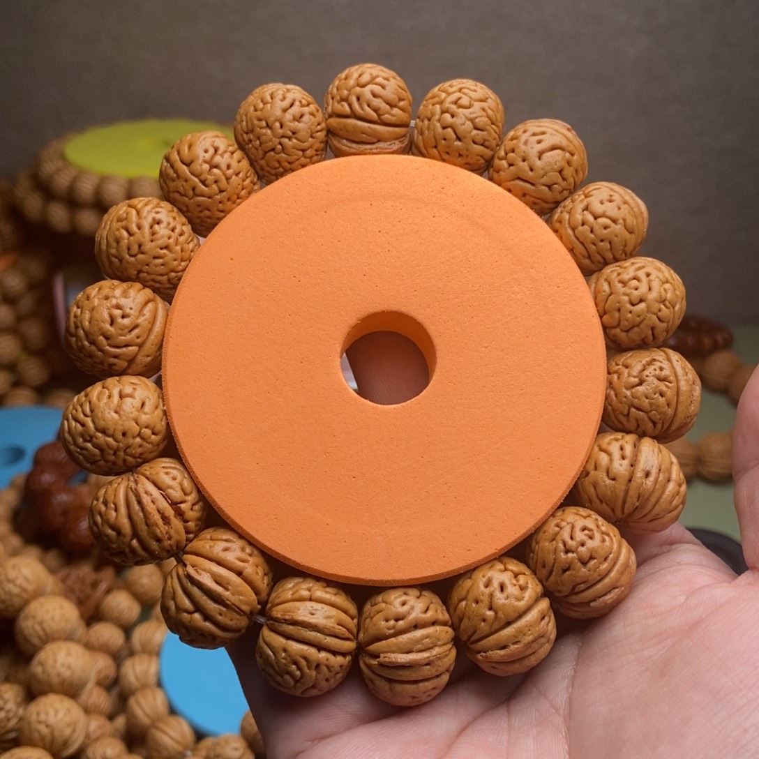 阳***。桃核手串金鱼肚桃核手串毕业款