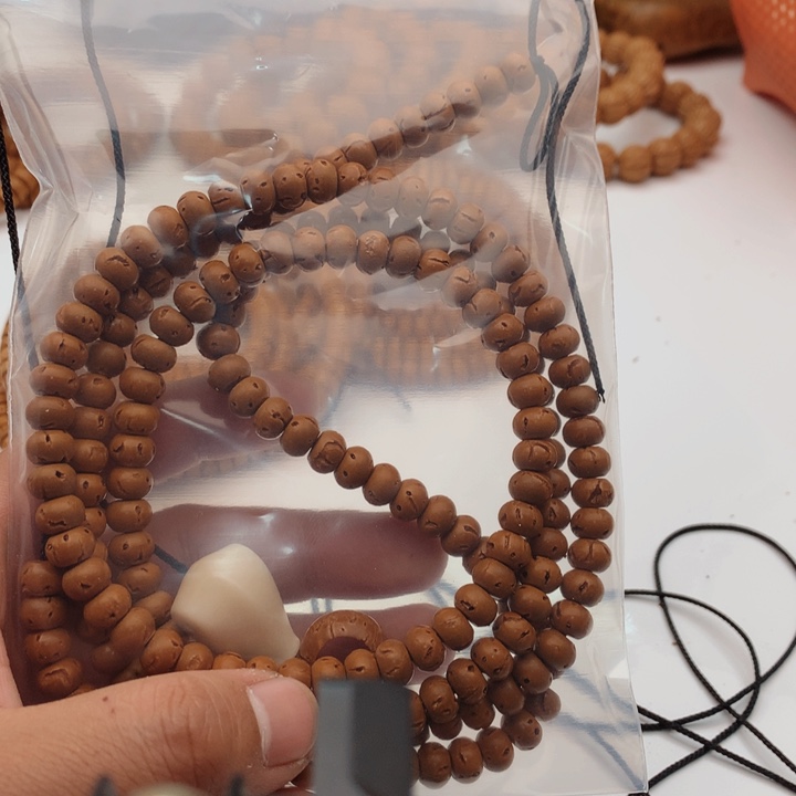 沧***。桃核脖挂精工脖挂