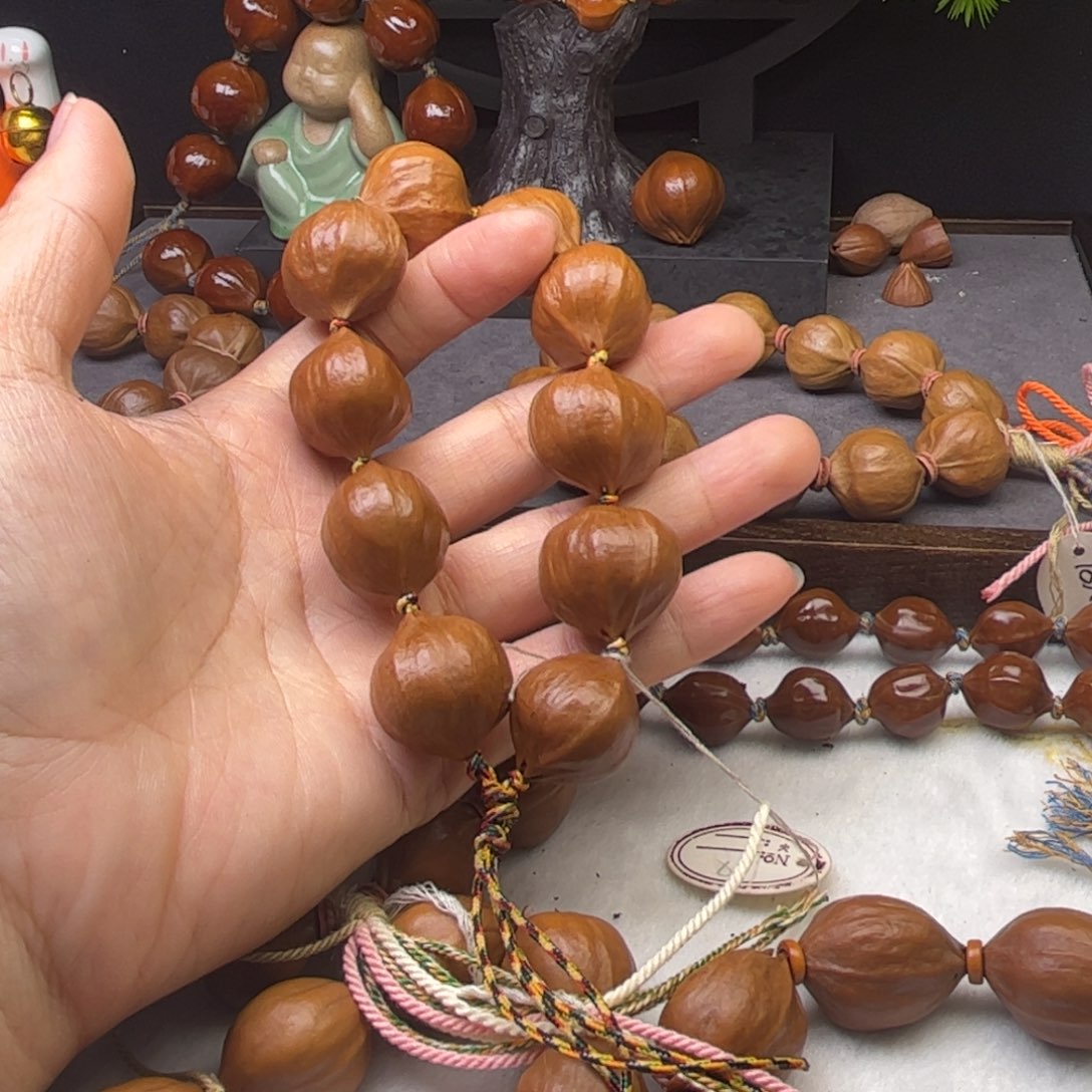 三***猴橄榄核手串/手链2.1*2.2原皮四花蒜头铁核树王精品