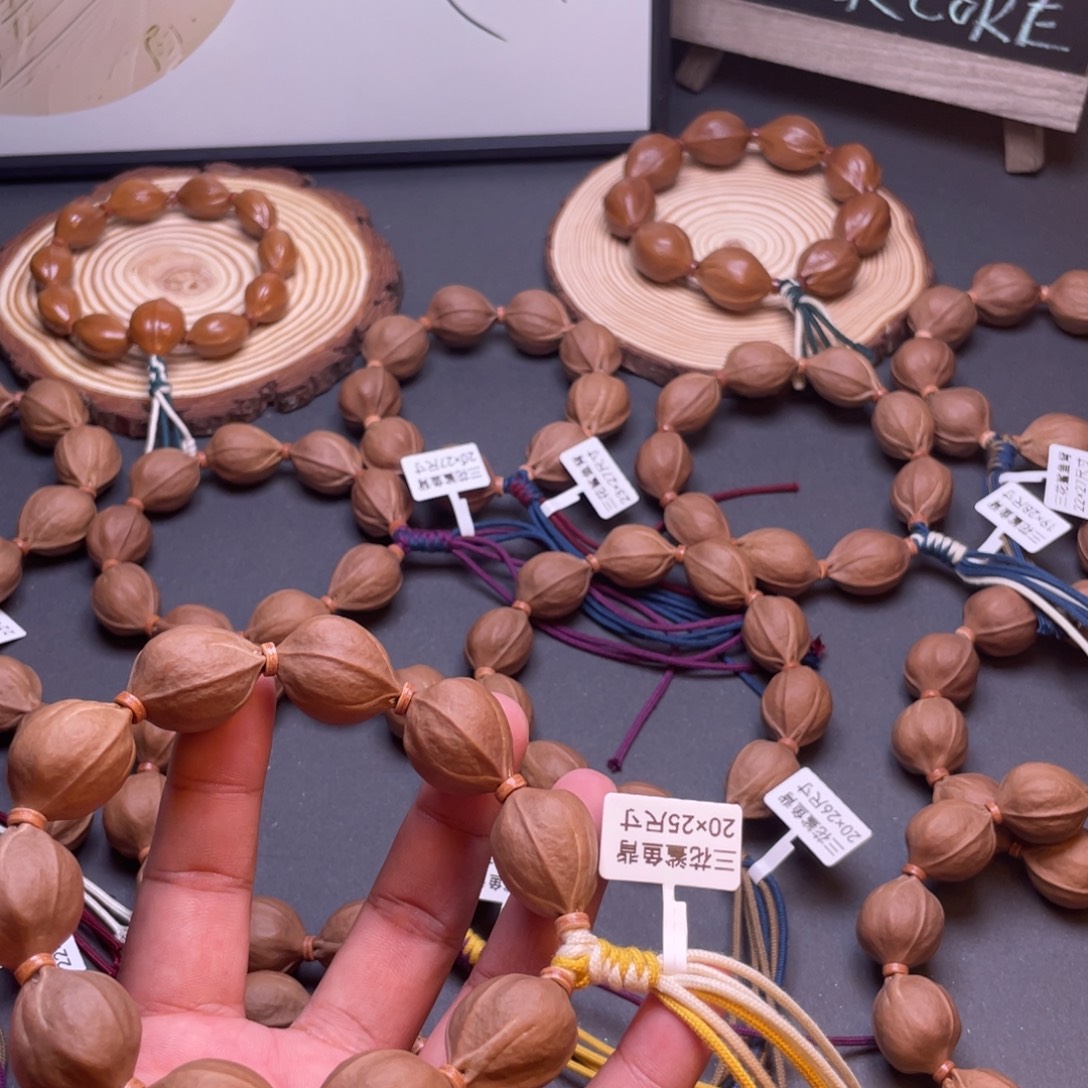 愉***皮橄榄核手串梅林铁核20×25CC