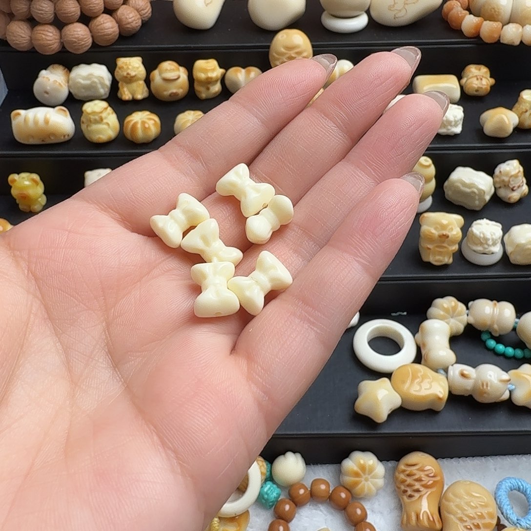 丸***桃手串猴头核桃小蝴蝶结