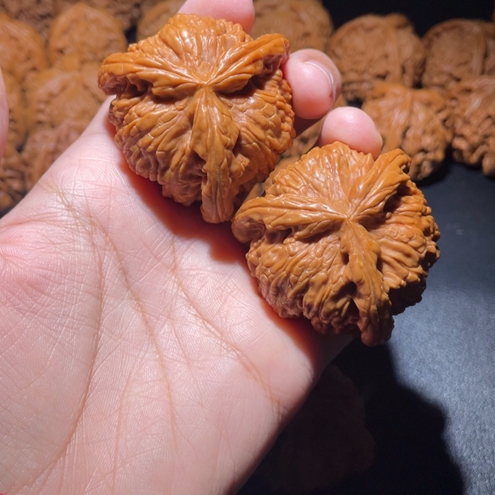 驰***下桃核吊坠小妹三棱