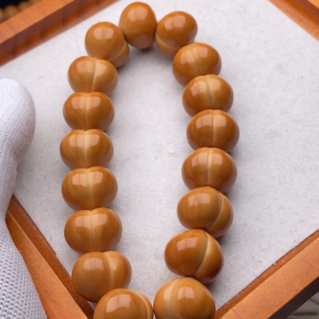 品***生猴头核桃吊坠聚宝盆屁桃