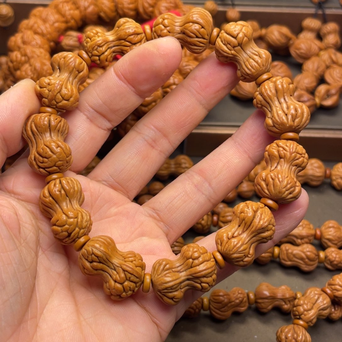 伊***东桃核手串龙纹桃核8