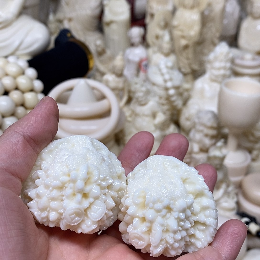 摆件猛犸象牙人**火核桃一对