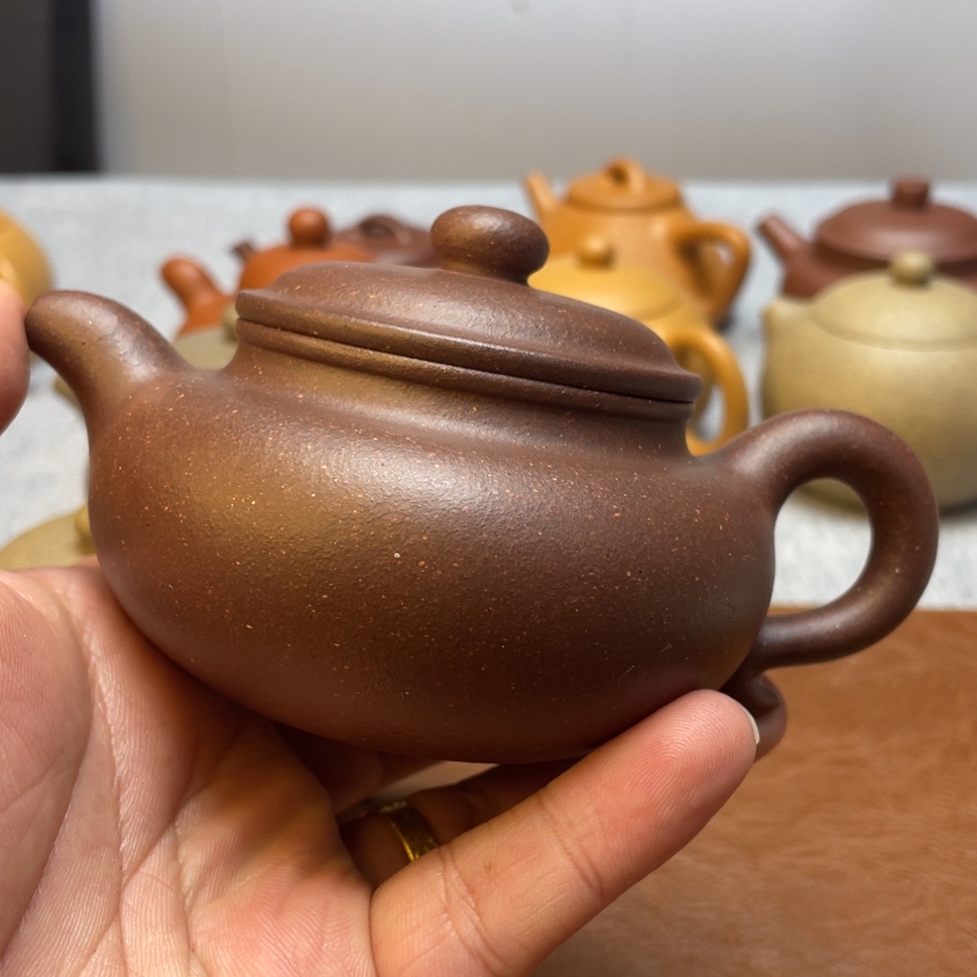 紫砂茶壶?**。全手处理