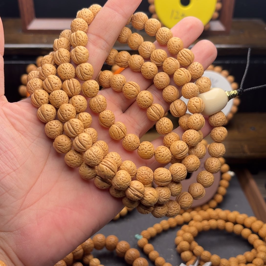 随***缘手串桃核奶油一根汀