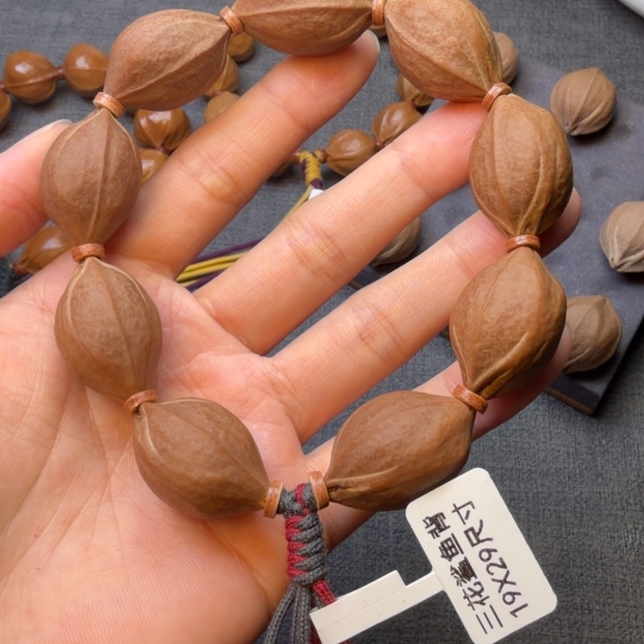 彪***哥橄榄核无事牌梅林铁核1929尺寸