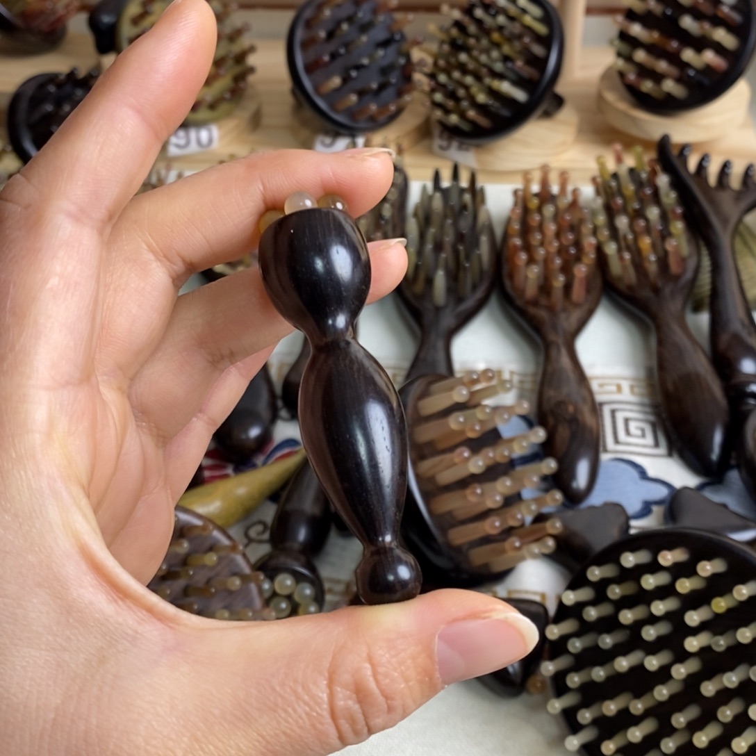 紫光檀按摩棒梳子