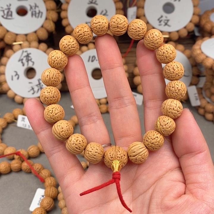 桃核手串灵珠12.5抛光尺寸误差0.5之间