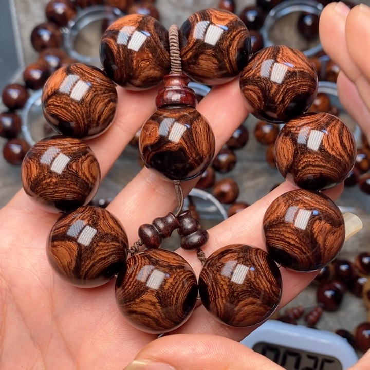 黄花梨/降香黄檀广****司紫油梨成品加工手串