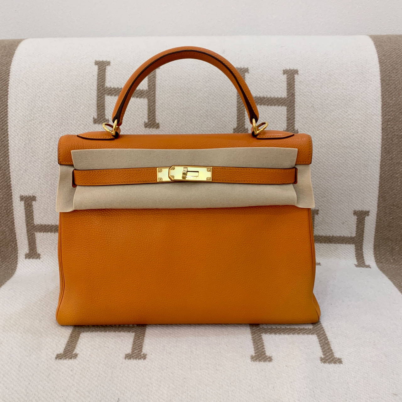 99新 Hermes/爱马仕 kelly32 爱马仕橘 银扣 togo皮 H刻xx0211b1