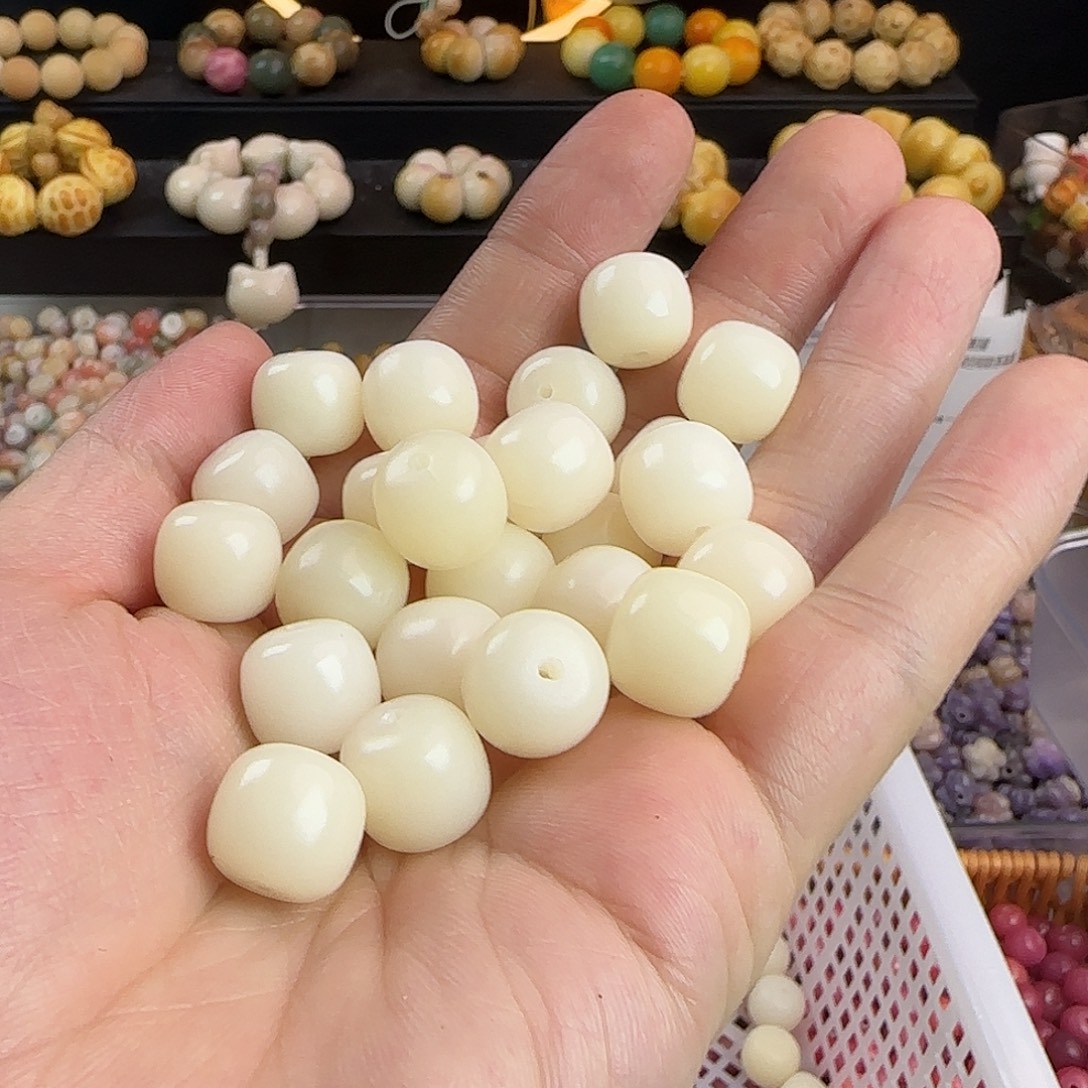 菩提根/象牙果手串微瑕卡14大白兔60颗