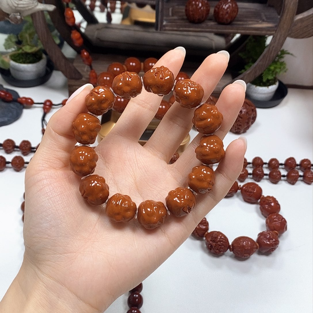 橄榄核把件咯*呱呱来财