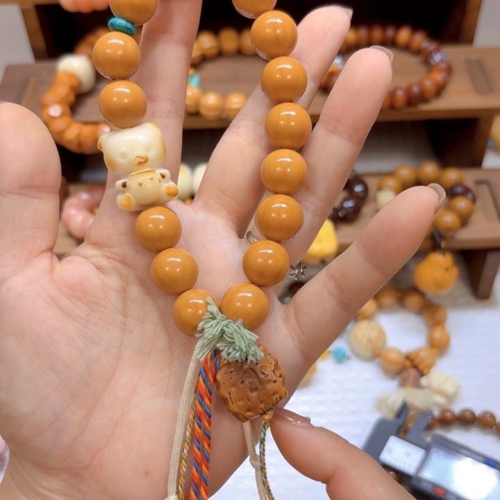 星月菩提手串猴头圆珠手持象牙果奶瓶熊