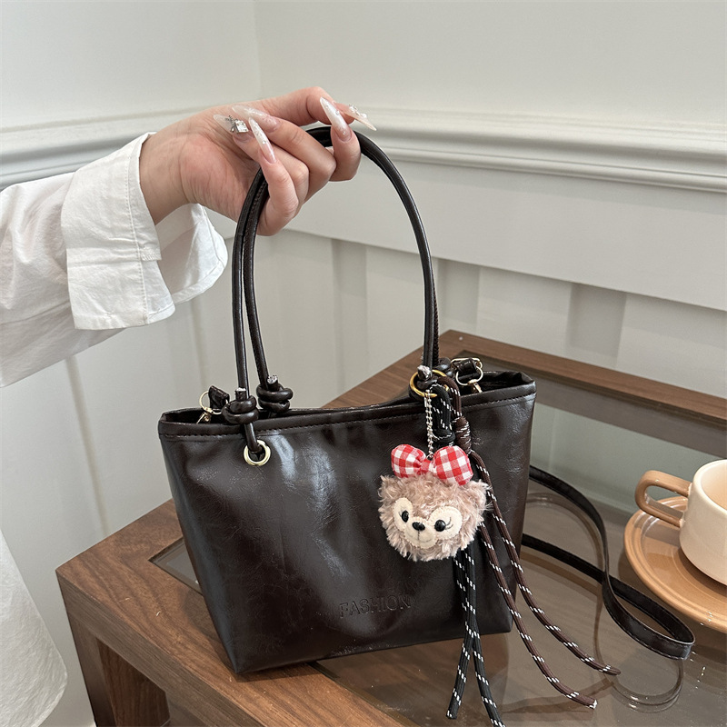 2025春季新款休闲简约时尚复古质感潮纯色通勤单肩斜挎水桶手提包