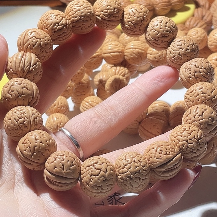 蛋***容吊坠桃核桃核手串玲珑塔58